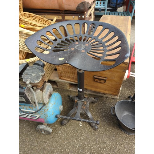 216 - Cast iron metal stool with adjustable tractor style seat