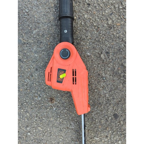 249 - Unbranded petrol strimmer, with harness.