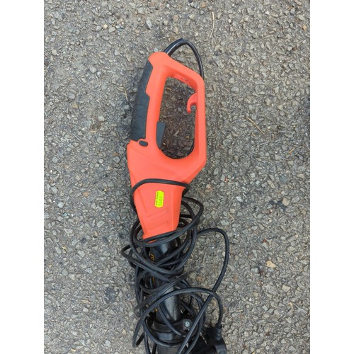 249 - Unbranded petrol strimmer, with harness.