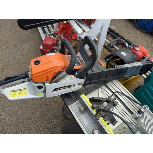 261 - Unbranded petrol chainsaw with spare chain