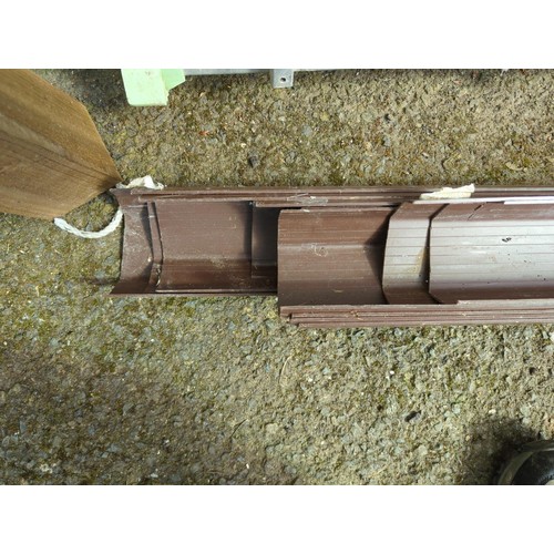 30 - Quantity of brown plastic guttering. Longest approx. 250cm