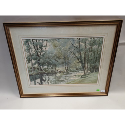 679 - F. F Errill, watercolour of cows on a riverbank, signed lower right, framed 75 x 59cm