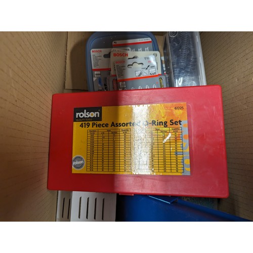 284 - Box of tools inc. as new jigsaw blades, wire stripper, o-ring set etc.