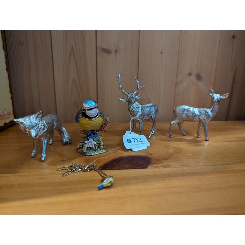 712 - Three white metal animals: stag (ht. 10cm), doe and a wolf together with a Little Gems blue tit trin... 