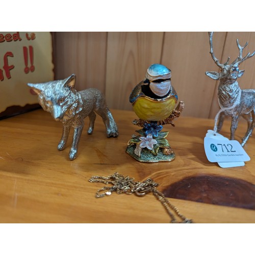 712 - Three white metal animals: stag (ht. 10cm), doe and a wolf together with a Little Gems blue tit trin... 