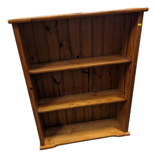 825 - 3 shelf pine bookcase. 84cm by 26cm by 105cm