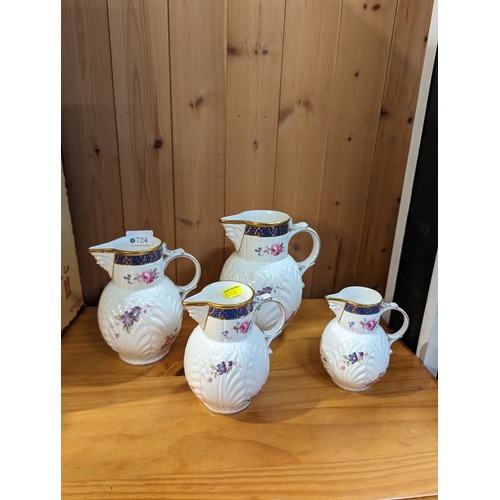 724 - Coalport, set of four graduated reproduction Caughley Mask-Head jugs, tallest 19cm