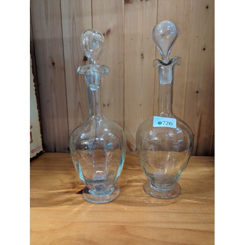 726 - Pair of hand blown glass decanters, ht. 32cm