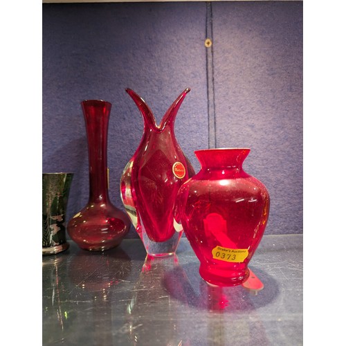 731 - Venetian green glass decanter, ht. 28cm vase and six glasses together with three red Murano vases