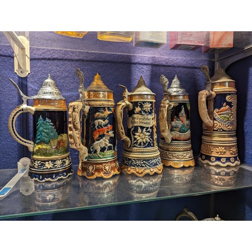 733 - Five musical ceramic beer steins