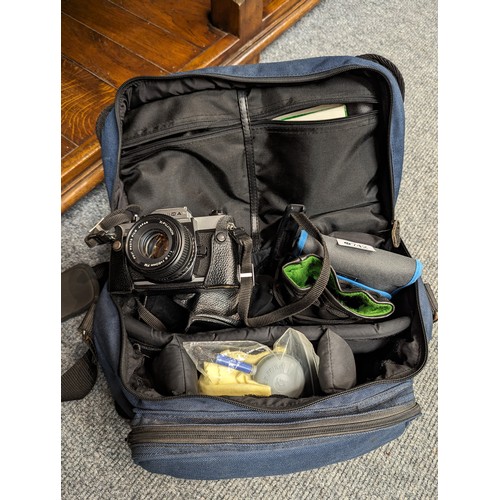 742 - Fujika STX-1 camera in bag with spare lens and other accessories