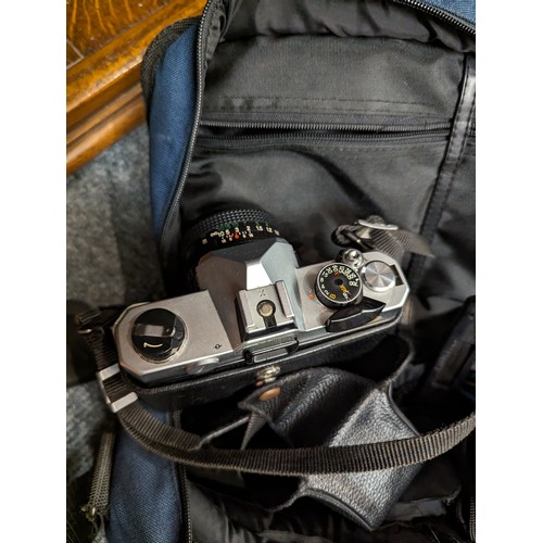 742 - Fujika STX-1 camera in bag with spare lens and other accessories