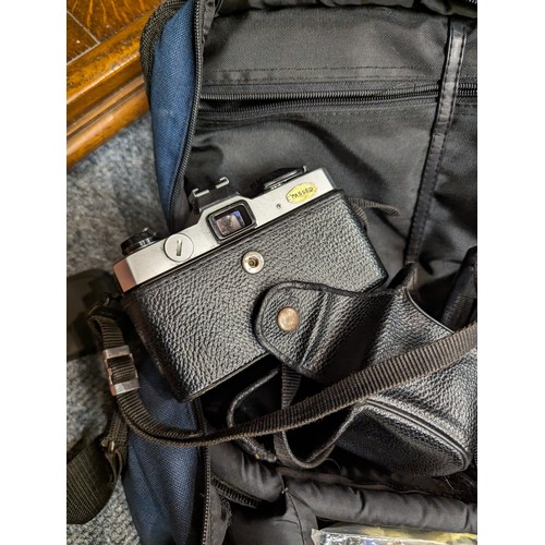 742 - Fujika STX-1 camera in bag with spare lens and other accessories