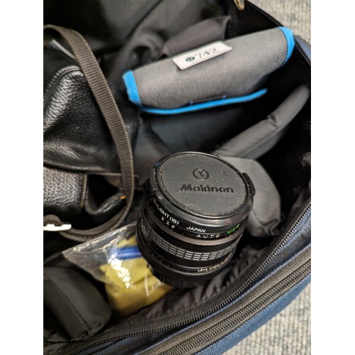 742 - Fujika STX-1 camera in bag with spare lens and other accessories