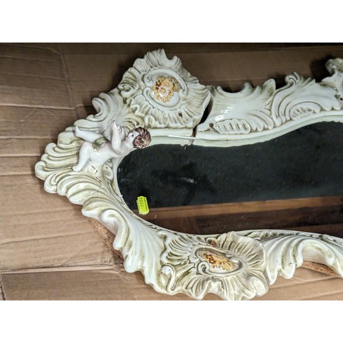 753 - Ornate ceramic framed mirror 86 x 50cm