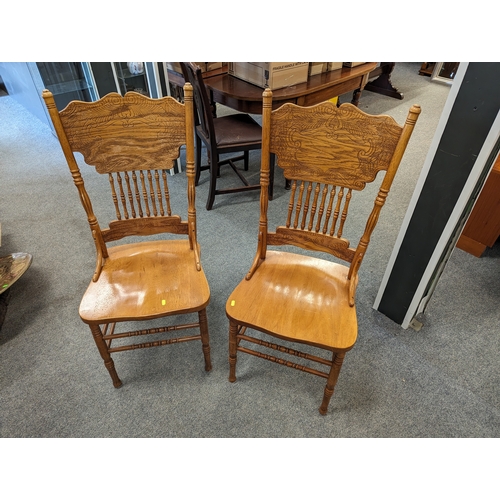 864 - 2 X  American style dining chairs.