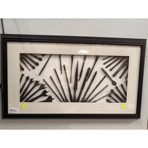 680 - Framed montage of drill heads 61 x 35.5cm