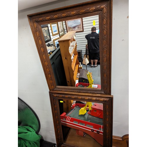 684 - Pair of carved oak framed mirrors 52 x 64cm