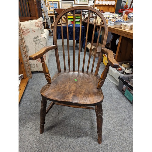 853 - Elm-seated stick back carver chair