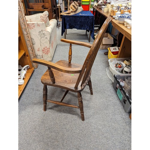 853 - Elm-seated stick back carver chair