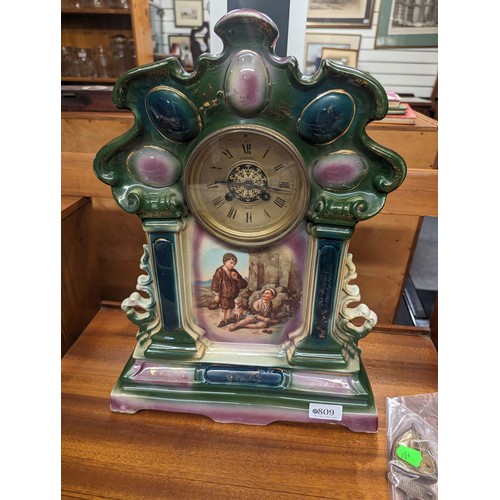 809 - Painted ceramic Mantle clock stamped S. Wotton, Bury, with pendulum & key 33x15 x ht 43