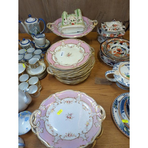 694 - Floral, pink and gilt plates, serving dishes and tazza together with a Staffordshire flatback castle... 