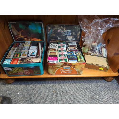 799 - 2 tins of matchboxes with some cigarette cards