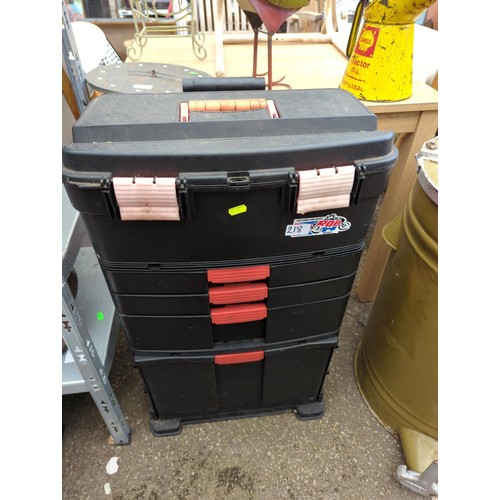 218 - Black stacking wheeled tool box with some tool contents