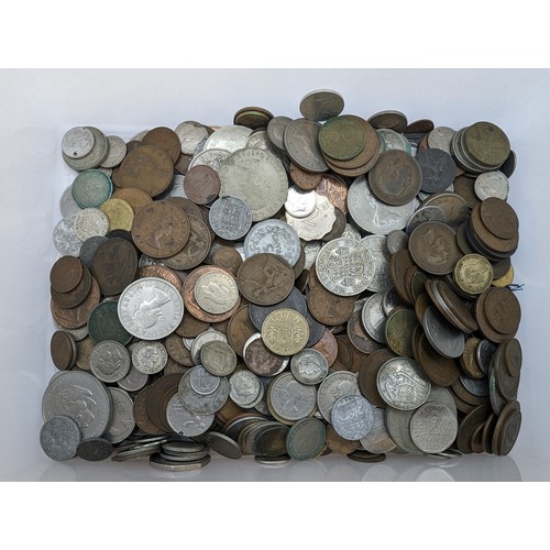 145 - Tub of British & world coins, including some commemorative medals, gross weight including tub 3.... 