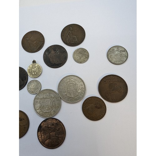 145 - Tub of British & world coins, including some commemorative medals, gross weight including tub 3.... 