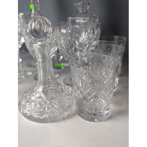 234 - Cut Glassware on shelf including decanters, tumblers ect