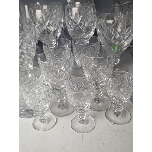 234 - Cut Glassware on shelf including decanters, tumblers ect