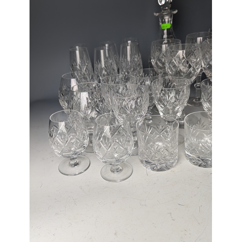 234 - Cut Glassware on shelf including decanters, tumblers ect