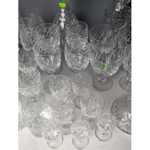 234 - Cut Glassware on shelf including decanters, tumblers ect