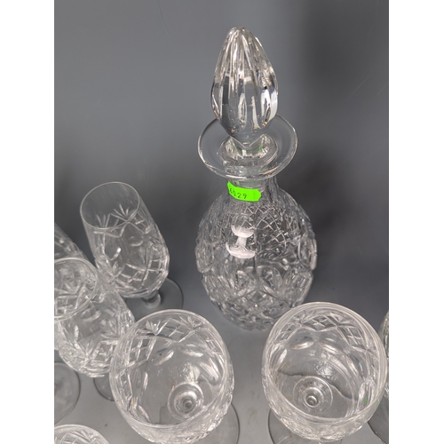 234 - Cut Glassware on shelf including decanters, tumblers ect