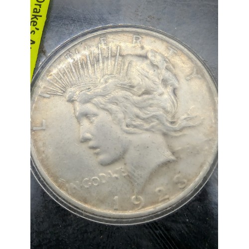 130 - US 1923 silver peace dollar in case