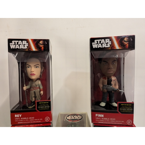 618 - Star Wars vinyl bobble-head including Rey, Finn, Captain Phasma, Greedo