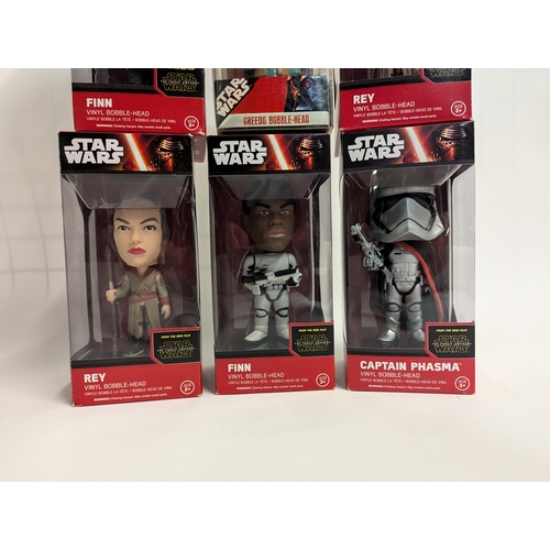 618 - Star Wars vinyl bobble-head including Rey, Finn, Captain Phasma, Greedo