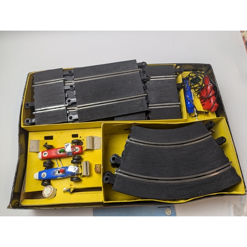 638 - Tri-ang Scalextric model electric motor racing with extra accessories track. Hand controller ect