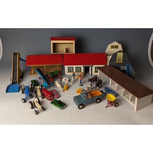 642 - Britains farm yard with animals buildings trees stables land rover l.w.b and other items. Including ... 