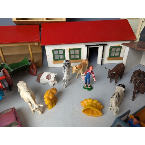 642 - Britains farm yard with animals buildings trees stables land rover l.w.b and other items. Including ... 