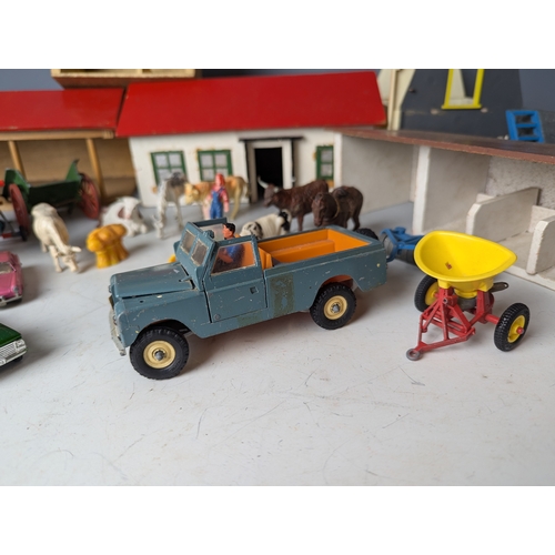 642 - Britains farm yard with animals buildings trees stables land rover l.w.b and other items. Including ... 