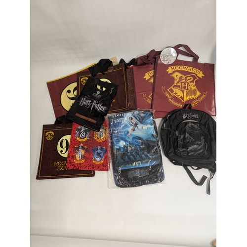 666 - Harry Potter bags and clothes including ladies dressing gown 16/18, ladies pyjamas 16/18. Ladies pyj... 