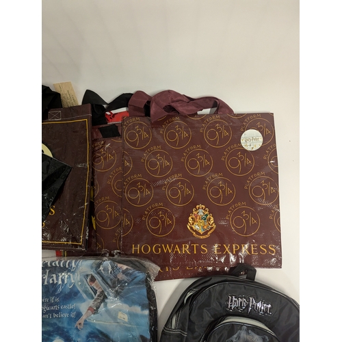 666 - Harry Potter bags and clothes including ladies dressing gown 16/18, ladies pyjamas 16/18. Ladies pyj... 