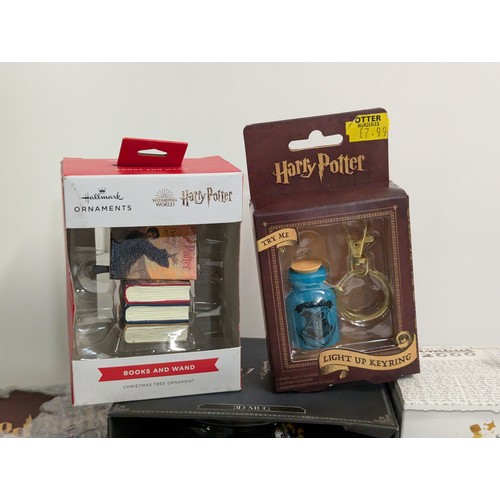 667 - Harry Potter misc. water bottles. 2 cauldron mugs. 2 drinking glasses. Xmas decorations. Lego PC gam... 