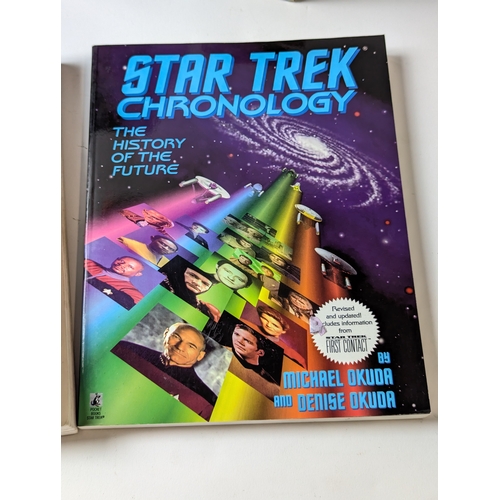 680 - Star Trek collector items including figures Khan noonie Singh, U.S.S Enterprise Bridge , Books