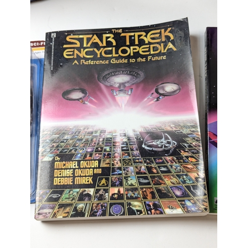 680 - Star Trek collector items including figures Khan noonie Singh, U.S.S Enterprise Bridge , Books