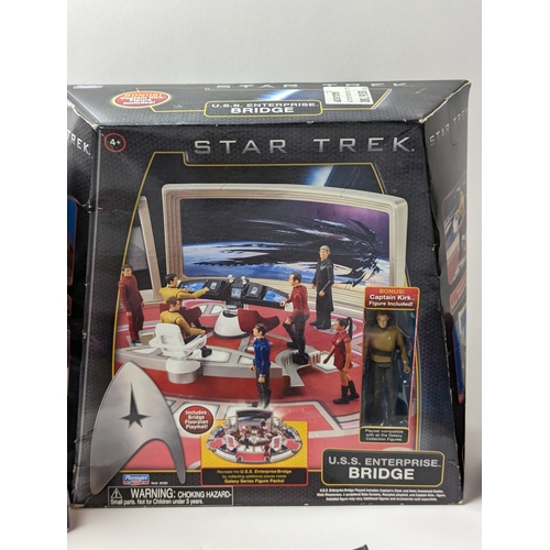 680 - Star Trek collector items including figures Khan noonie Singh, U.S.S Enterprise Bridge , Books