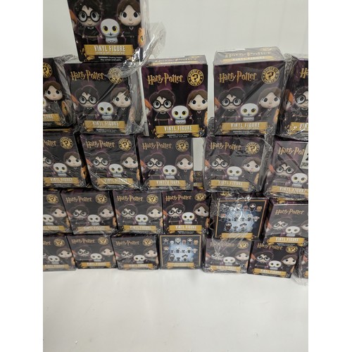 686 - Harry Potter vinyl figures. Series 1 (purple background). 42 various figures inc. Harry Potter, Herm... 