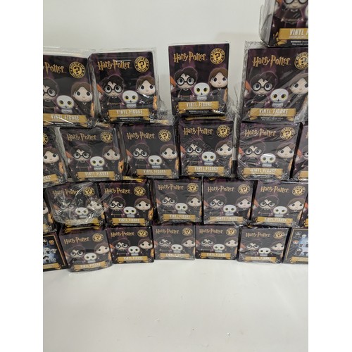 686 - Harry Potter vinyl figures. Series 1 (purple background). 42 various figures inc. Harry Potter, Herm... 